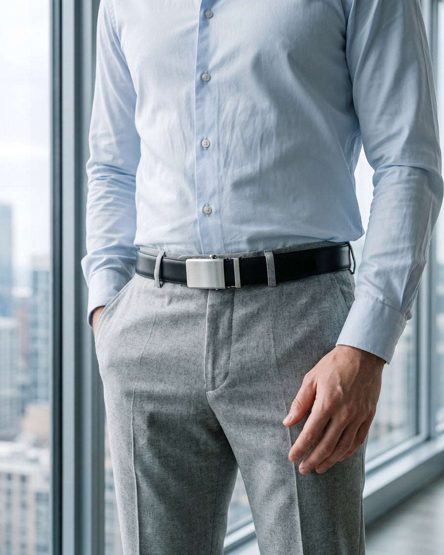 Harrow automatic Italian leather belt, brushed silver buckle, black strap – worn on a model